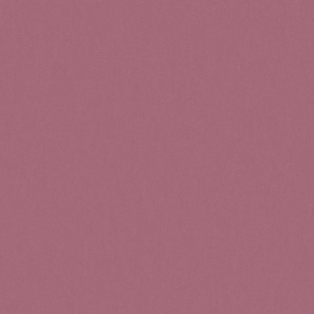 Muted thistle mauve fabric with a fine, softly textured plain weave