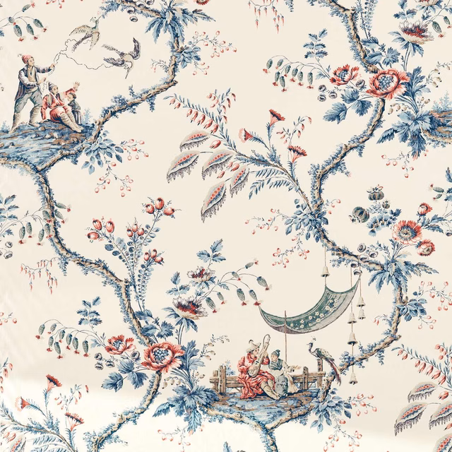 Ivory and indigo chinoiserie fabric with coral flowers, figures and branching foliage