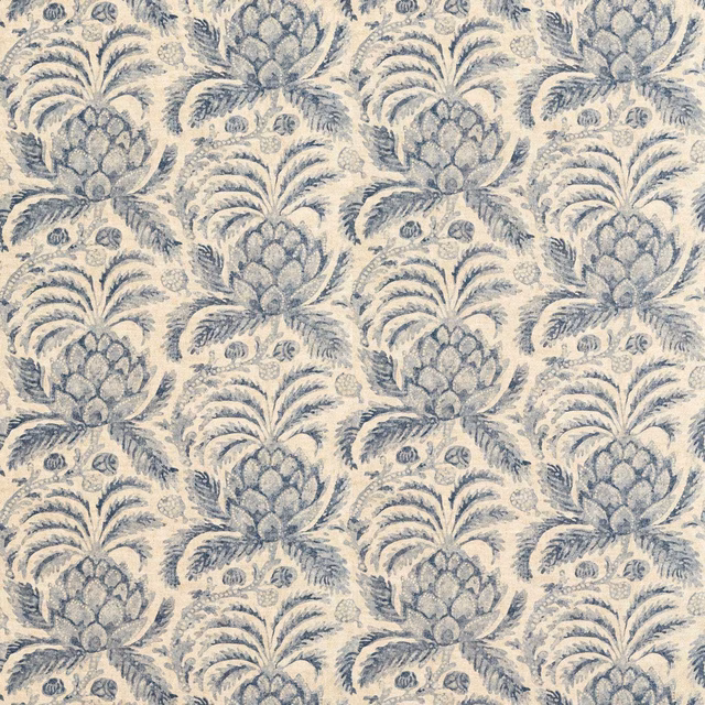 Soft indigo pineapple and palm motifs across a textured ivory fabric ground