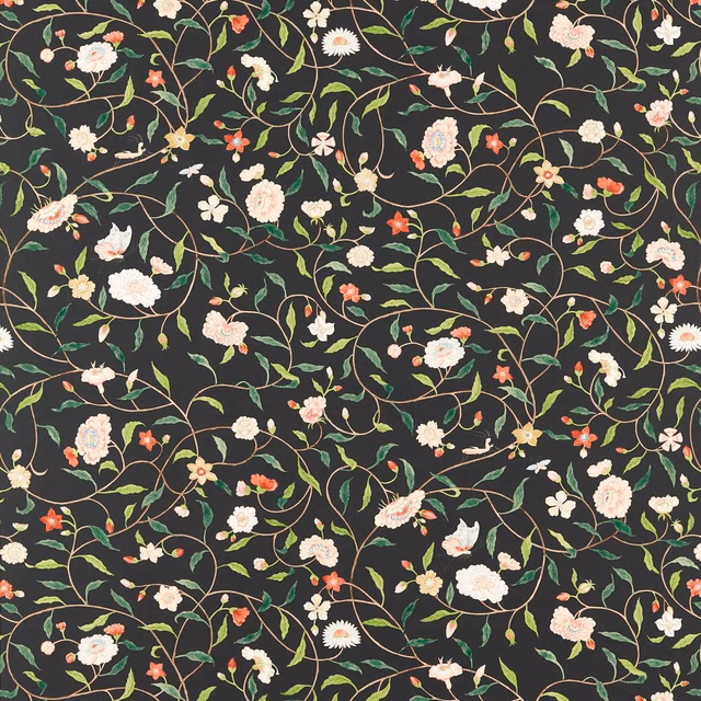 Charcoal-black wallpaper with looping green vines and ivory, blush and coral flowers