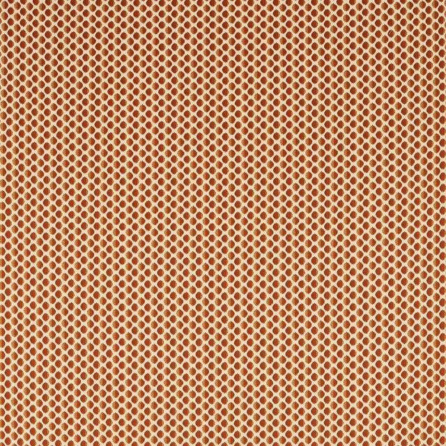 Warm amber woven fabric with a pale cream lozenge lattice and subtle texture