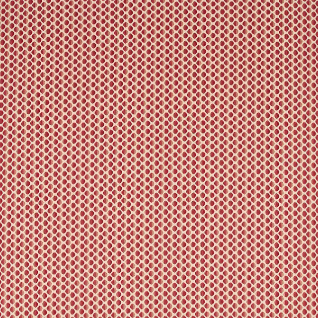Deep crimson woven fabric with a tiny ivory diamond-like spot lattice