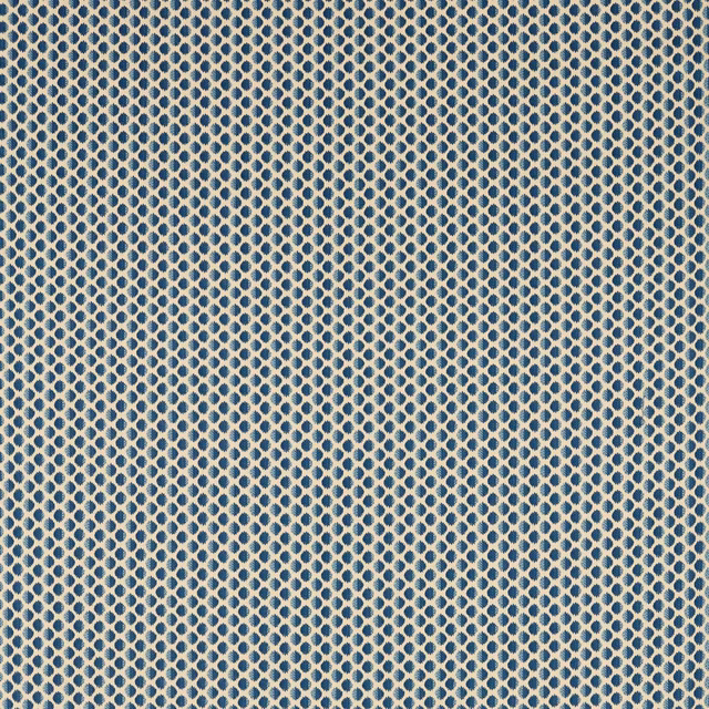 Muted indigo and cream woven fabric with a fine repeating oval lattice pattern