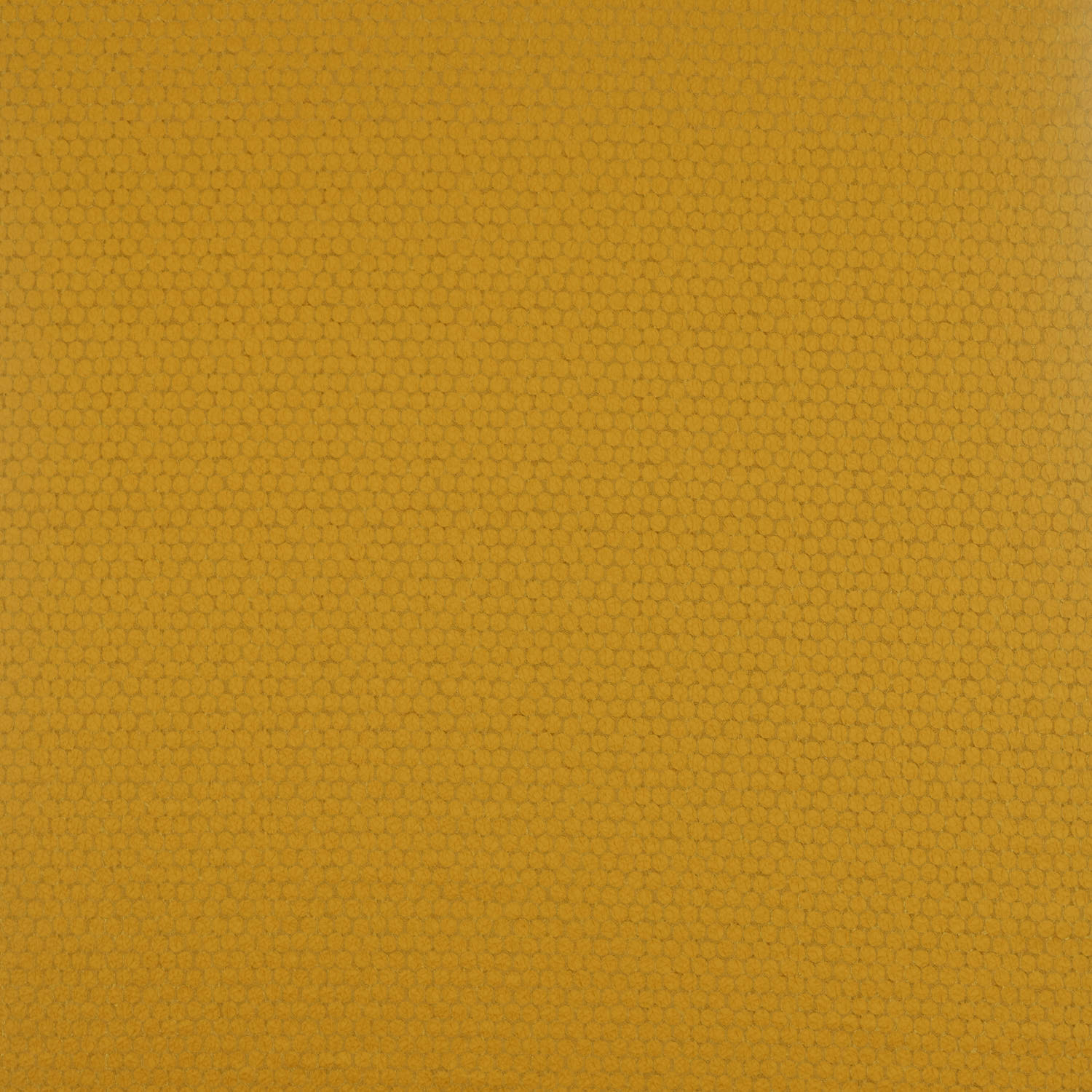 Close-up of ochre-gold woven fabric with a tiny tonal honeycomb texture