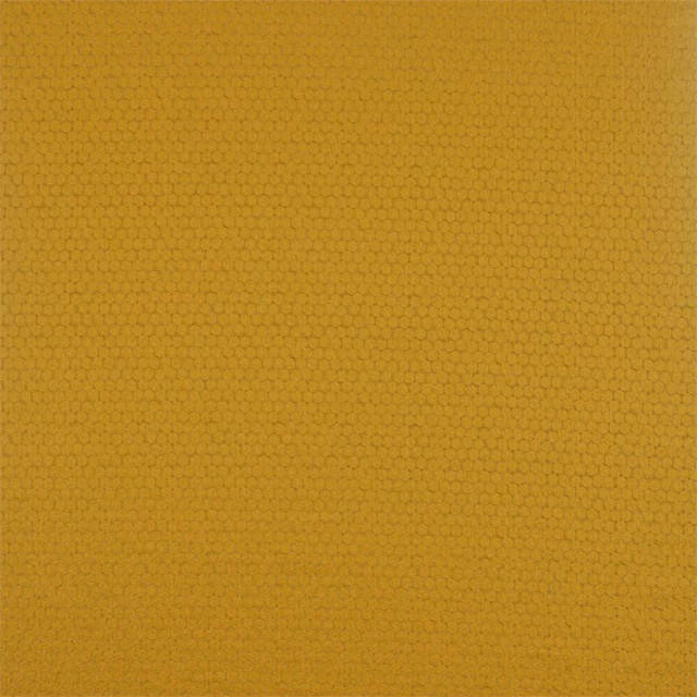Close-up of ochre-gold woven fabric with a tiny tonal honeycomb texture
