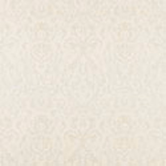 Pale chalk ivory wallpaper with a barely-there scrolling damask motif