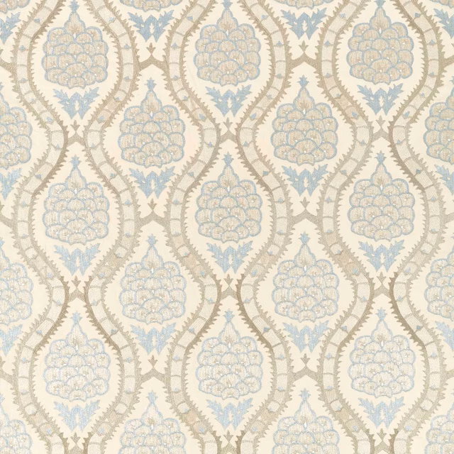 Muted Stockholm blue floral medallions in platinum-grey trellis on a textured woven ground