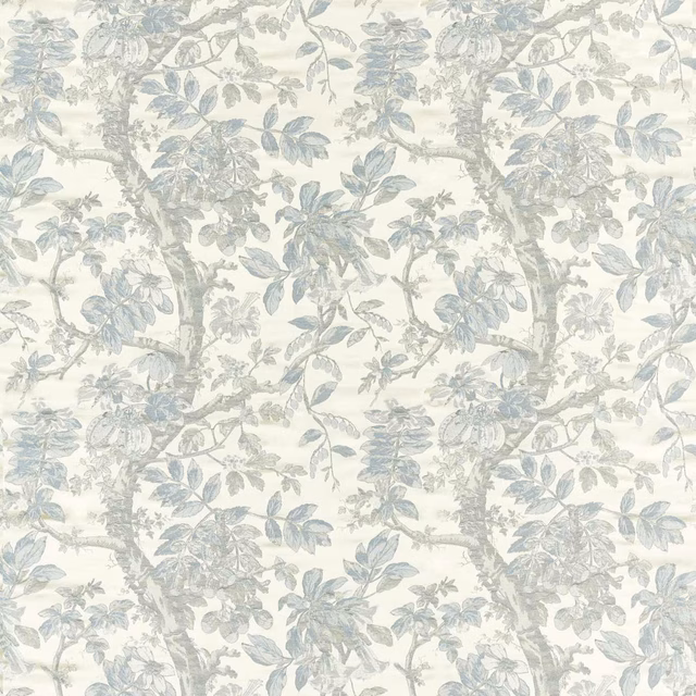 Muted blue-grey botanical branches and leaves woven across an ivory ground