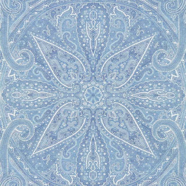 Pale indigo-blue wallpaper with white paisley scrolls and central floral medallion