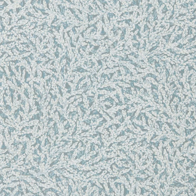Pale blue-grey wallpaper with dense white leafy botanical trails and soft printed texture