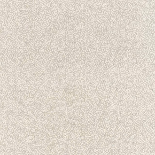 Close-up of platinum-white textile with a fine tonal maze pattern and dense woven texture