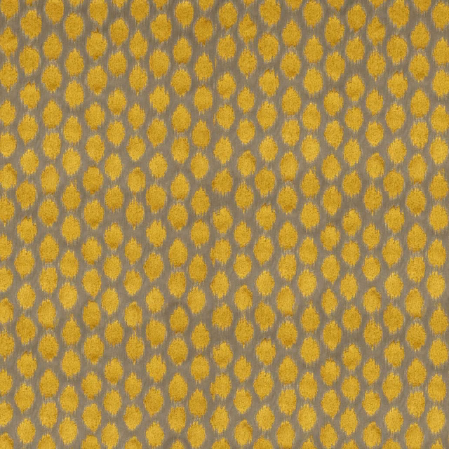 Ochre-gold ikat spots shimmer across a softly mottled taupe velvet ground