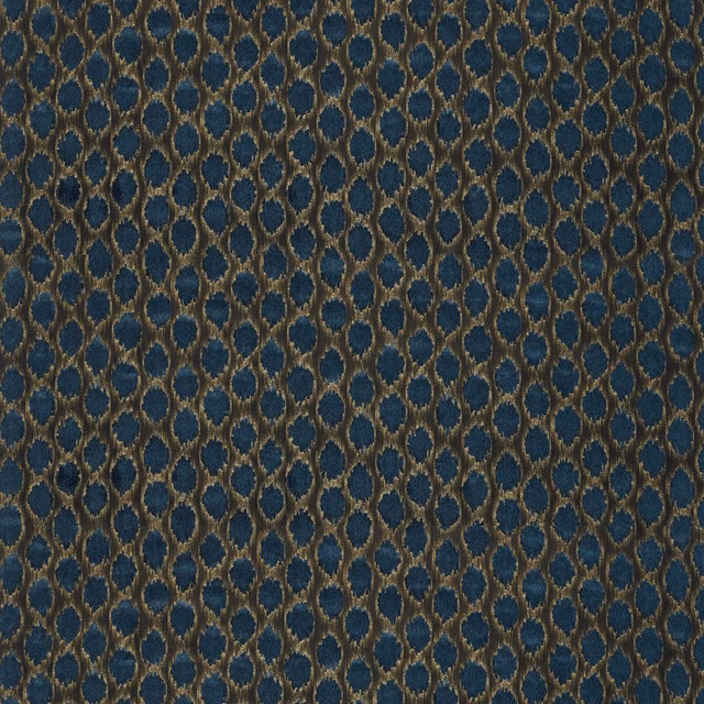 Deep ink-blue velvet with bronze oval ikat spots and a plush pile