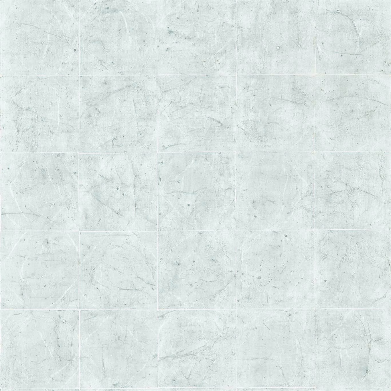 Pale blue-grey distressed tile wallpaper with faint rectangular joints and mineral scuffs