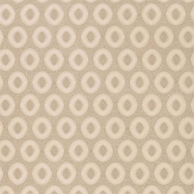 Warm antique-copper wallpaper with cream oval medallions and dotted texture