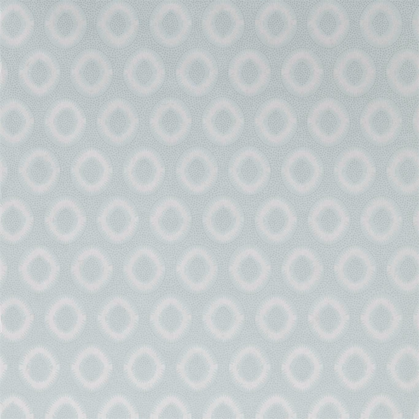 Cool storm-grey wallpaper with pale circular motifs and fine dotted texture