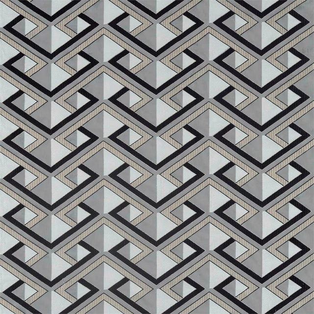 Cool zinc-grey geometric weave with charcoal zigzags and stepped diamond motifs