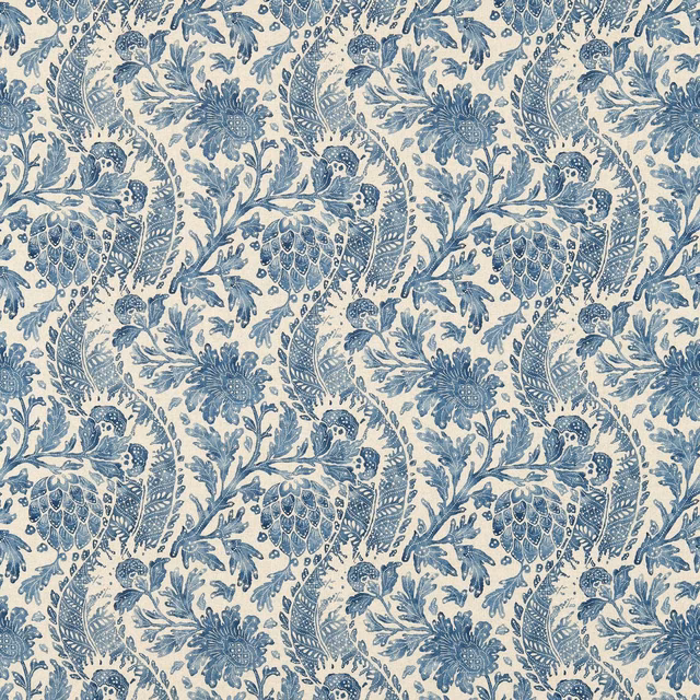 Muted indigo birds and botanicals repeat across an ivory textile ground