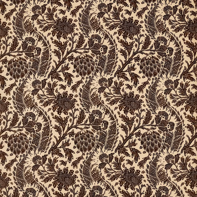 Warm beige textile with black pomegranate, floral and scrolling vine motifs