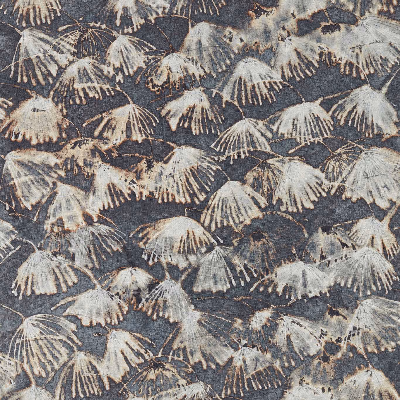 Blue-stone textile with chalky fan-shaped botanical motifs and distressed grey detail