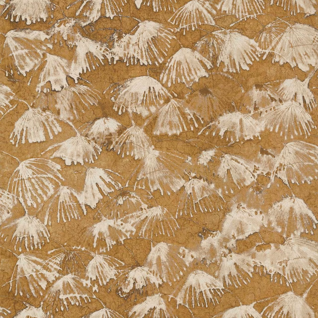 Warm ochre fabric with ivory fan-like botanical motifs and a tactile ground