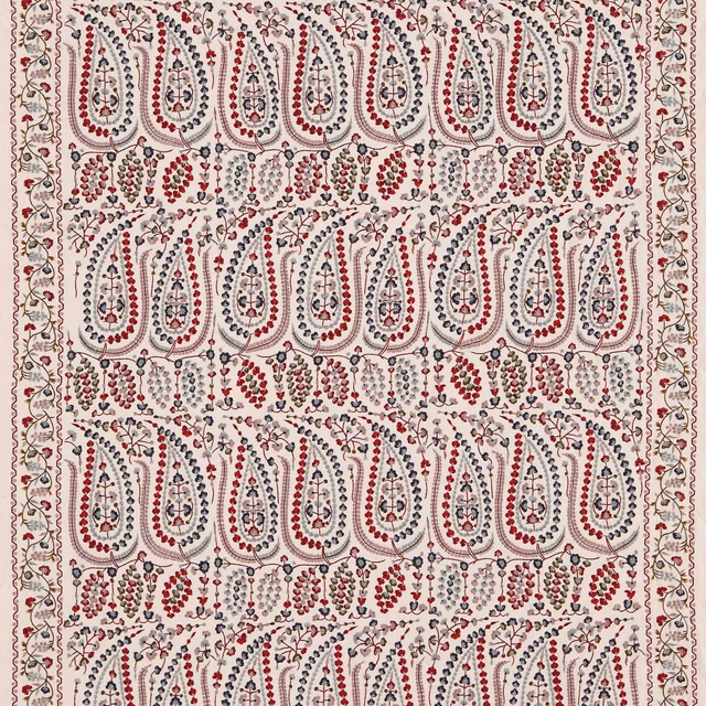 Ivory fabric with rows of red and blue floral paisleys and fine linework