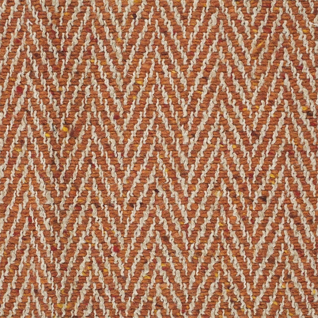 Burnt orange woven upholstery with raised ivory zigzags and subtle golden flecks