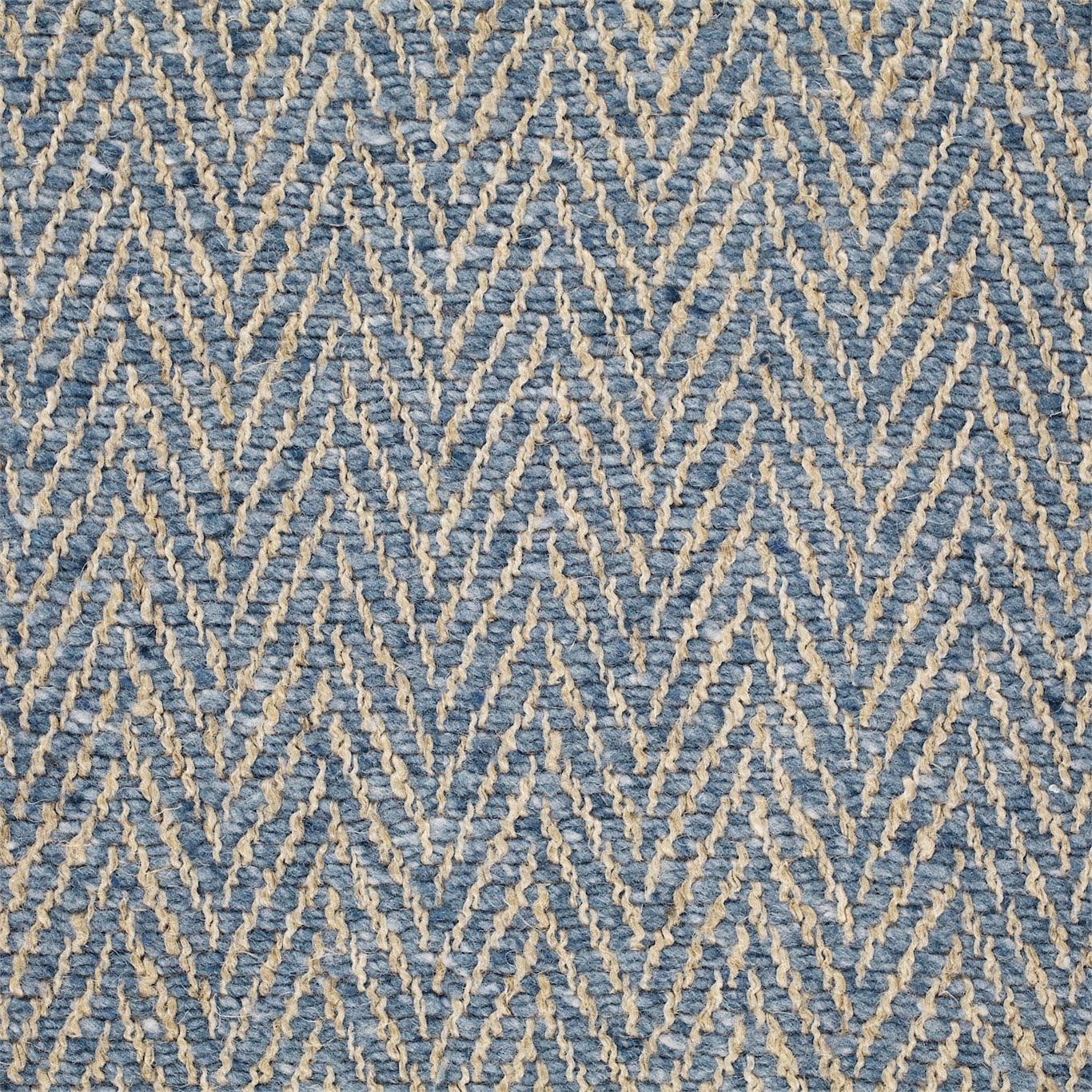 Muted blue-grey woven fabric with pale raised zigzag lines and tactile texture