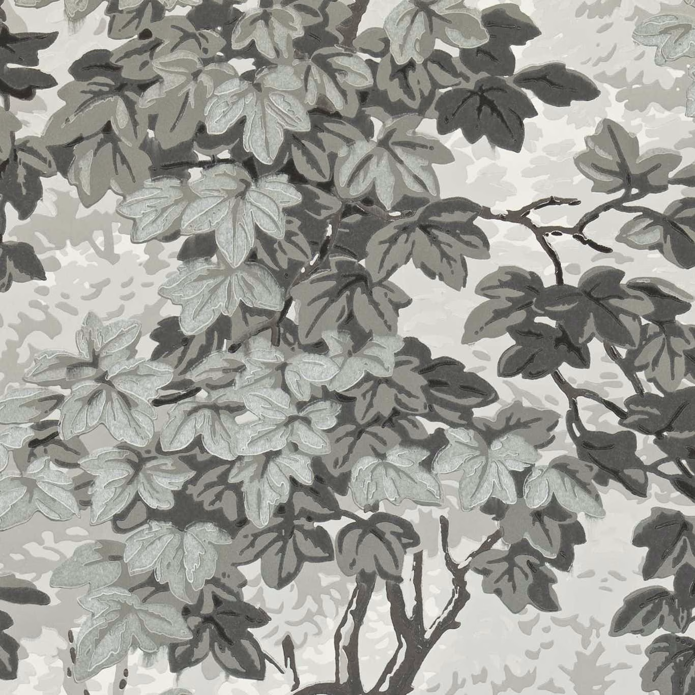 Dense charcoal and silver-grey leafy branches on a pale grey wallpaper ground