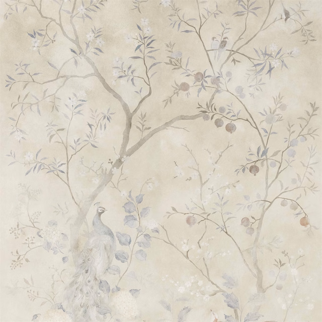 Pale ivory wallpaper with blue-grey branches, fruit and a peacock motif
