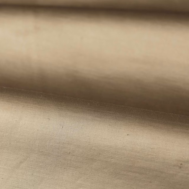 Muted fossil taupe plain weave with softly shaded horizontal grain