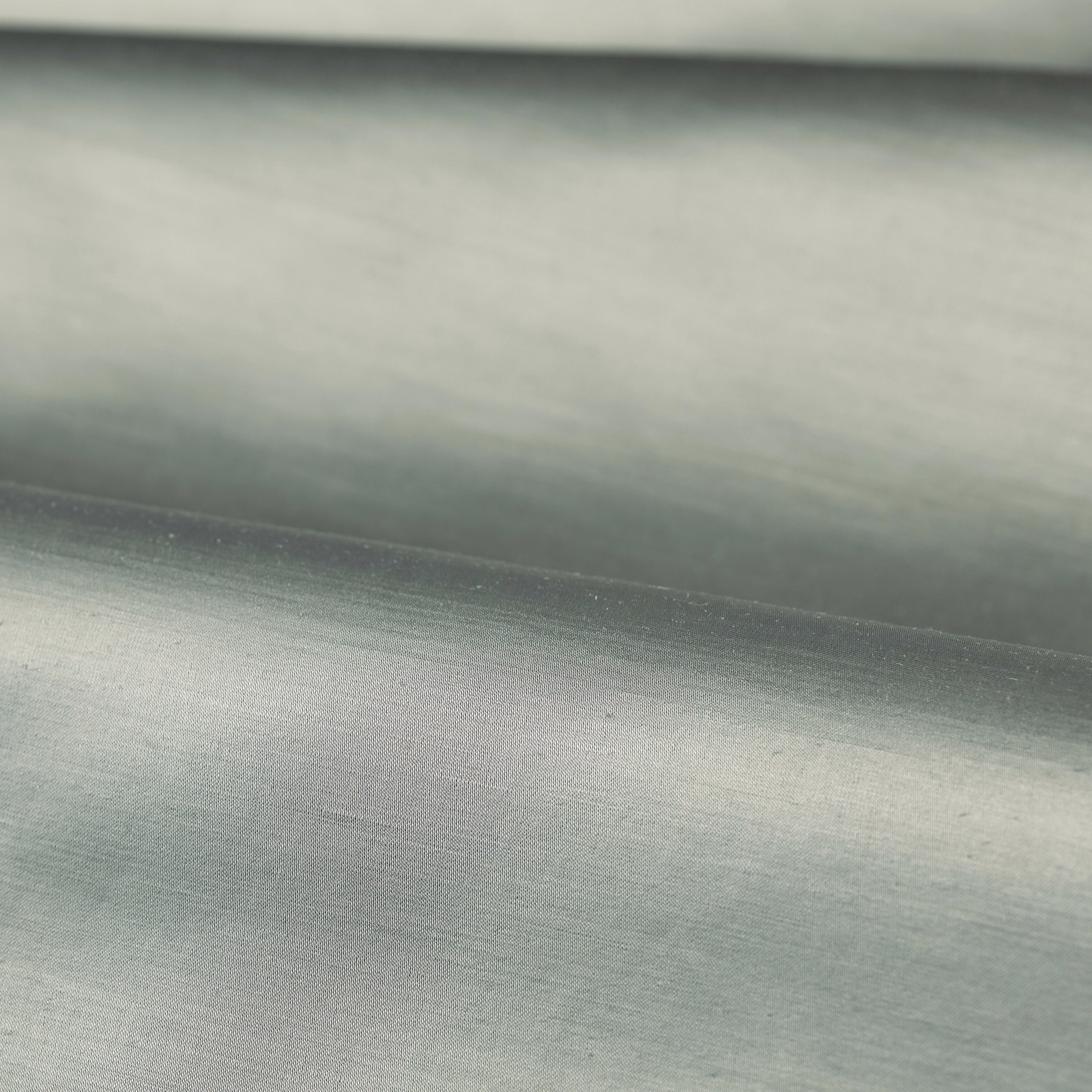 Pale duck egg blue-green plain weave with softly shaded horizontal folds