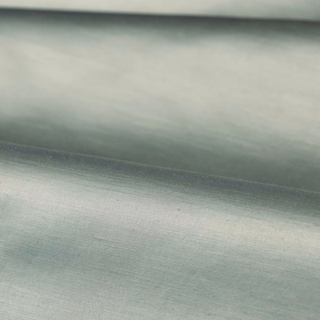 Pale duck egg blue-green plain weave with softly shaded horizontal folds