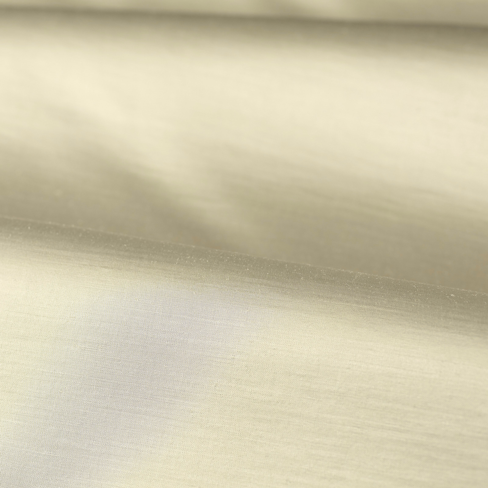Soft ivory opal plain weave fabric with a gentle horizontal sheen