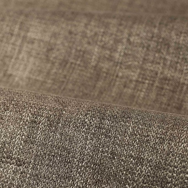 Mottled stone-taupe textile with a dense granular weave and softly shaded surface