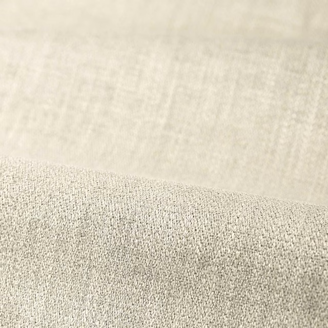 Pale mist-grey plain upholstery fabric showing a dense, softly pebbled woven texture