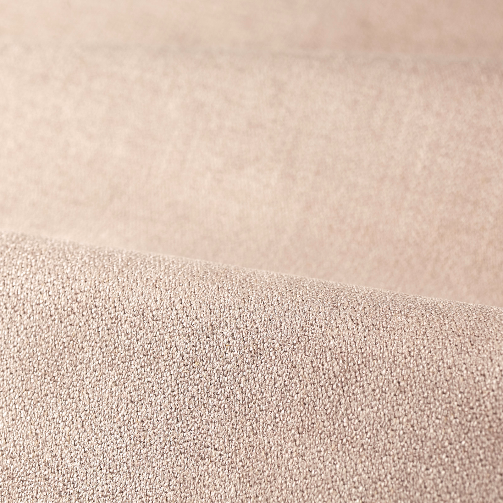 Pale blush-rose woven upholstery textile with a fine pebbled surface