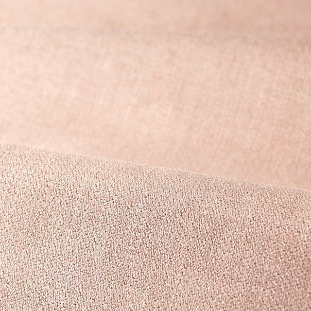 Pale blush-rose woven upholstery textile with a fine pebbled surface