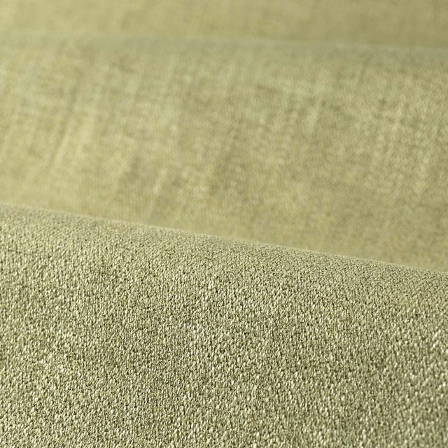 Close-up of muted sage green fabric with a dense, subtly pebbled weave
