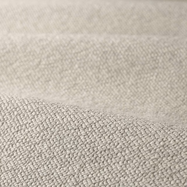 Pale warm-grey boucle with dense rounded loops and a softly mottled surface