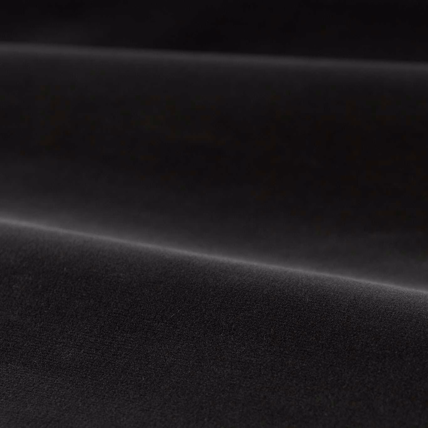 Deep anthracite-black plain velvet with a soft directional sheen across the pile
