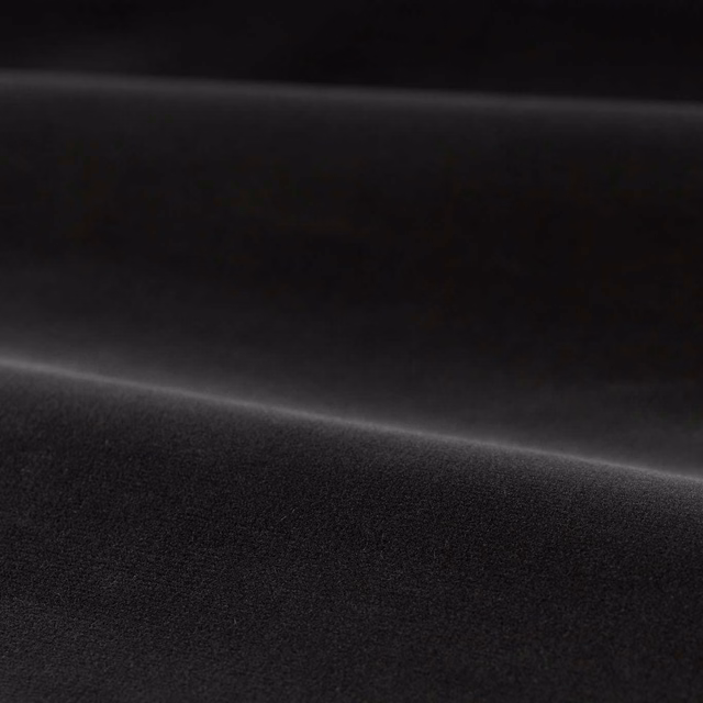 Deep anthracite-black plain velvet with a soft directional sheen across the pile