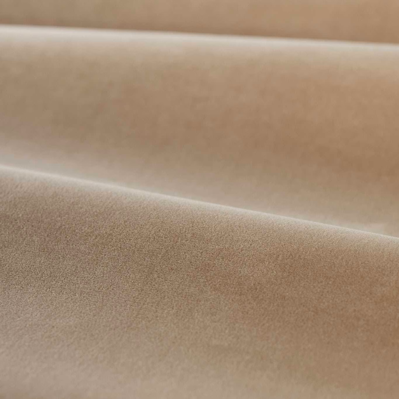 Warm parchment beige plain velvet folded to show a soft directional sheen