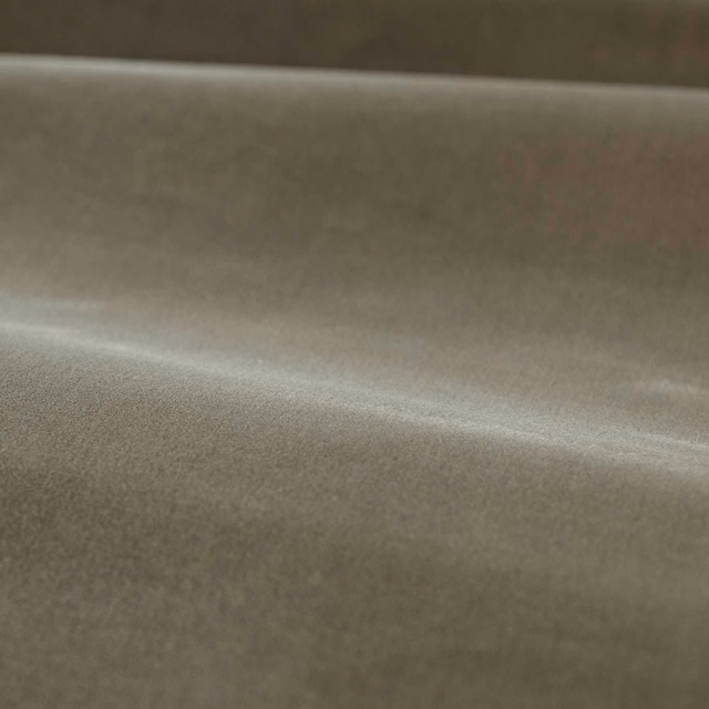Close view of muted silver-grey plain velvet with a softly luminous nap