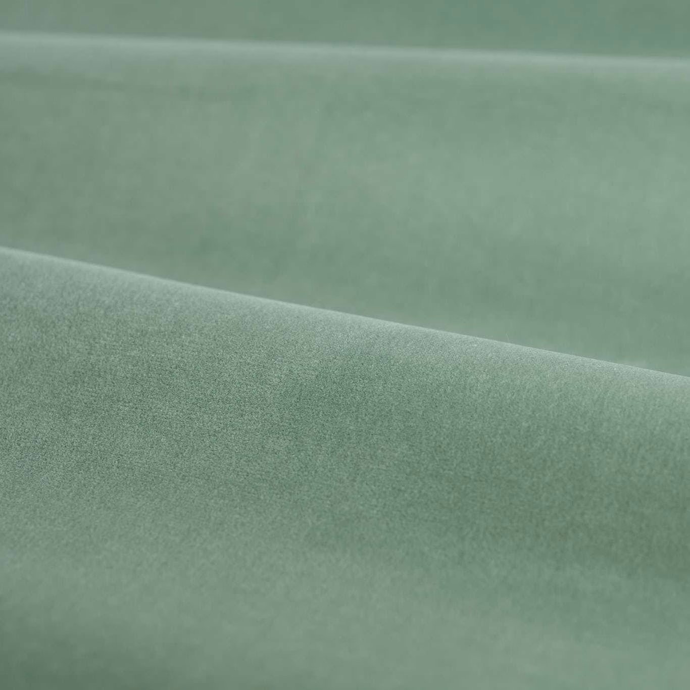Muted seafoam-blue velvet showing a softly brushed nap across folded swatch