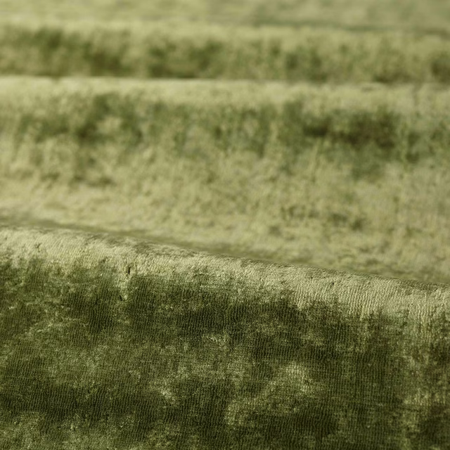 Deep fern olive-green velvet with a softly mottled, directional pile