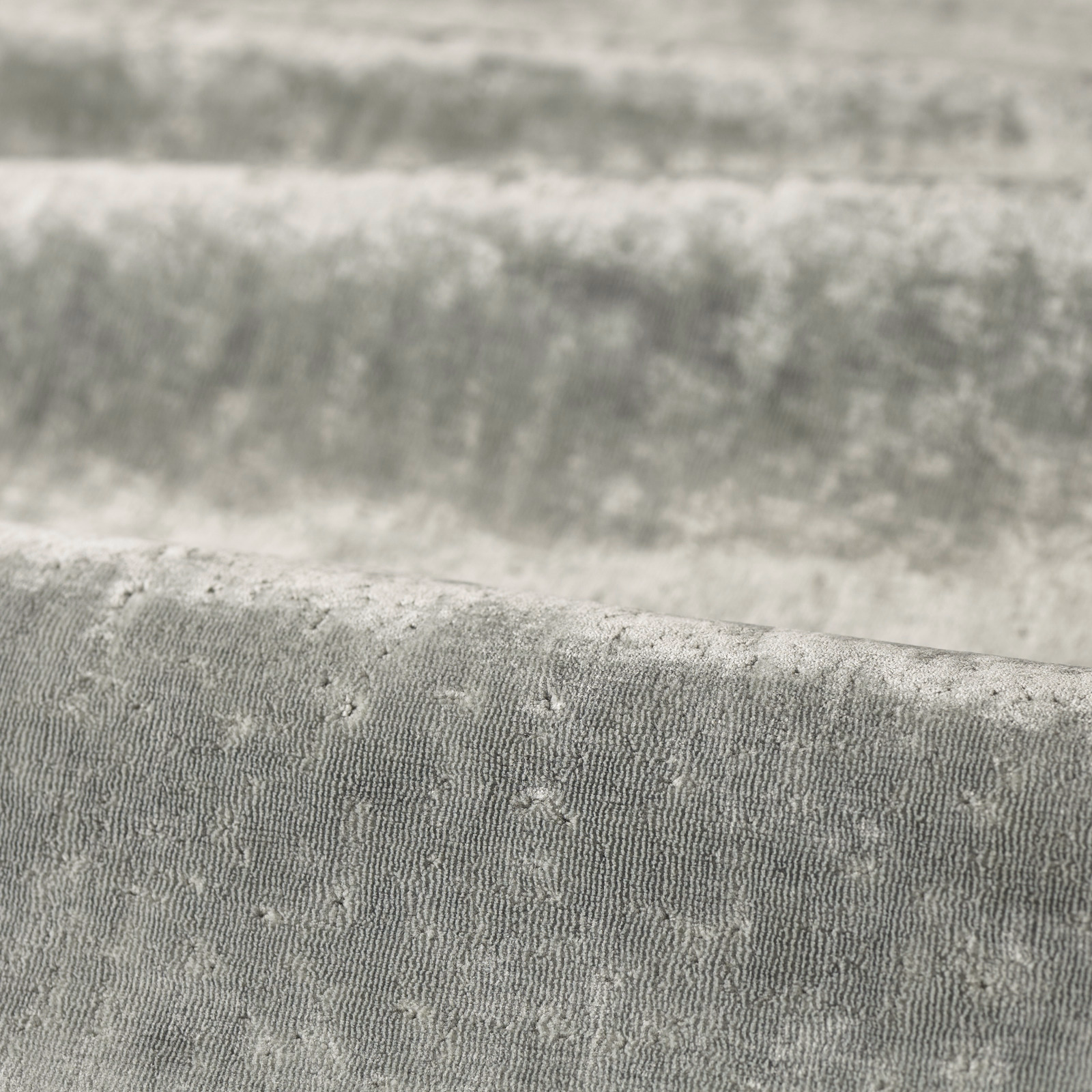 Close-up of cool Nimbus grey textile with fine ribbing and irregular flecked texture