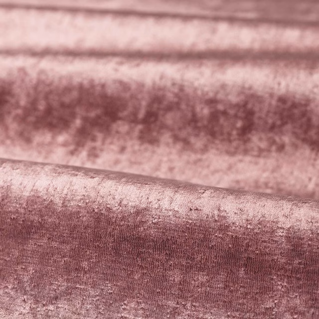 Dusty plum velvet with rose-mauve highlights and a directional plush pile