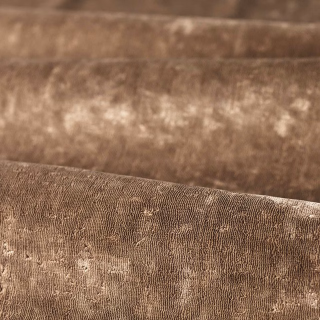 Warm sable taupe textile with fine vertical ridges and softly mottled pale flecks