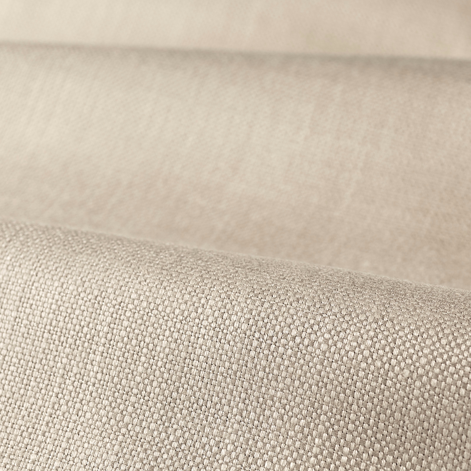 Close-up of warm bisque plain weave showing a fine, even woven grain